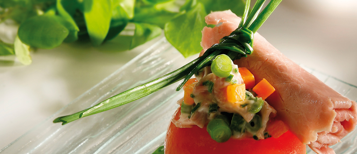 La petite tomate débordante de jambon Dégraissé Aubel®